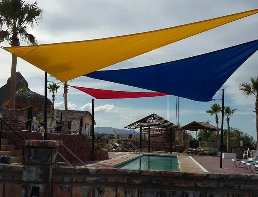 Three sails over pool in Baja Mexico.webp width=900 height=688